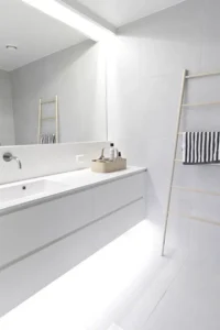 12 fill your white bathroom with light hiding some of them above